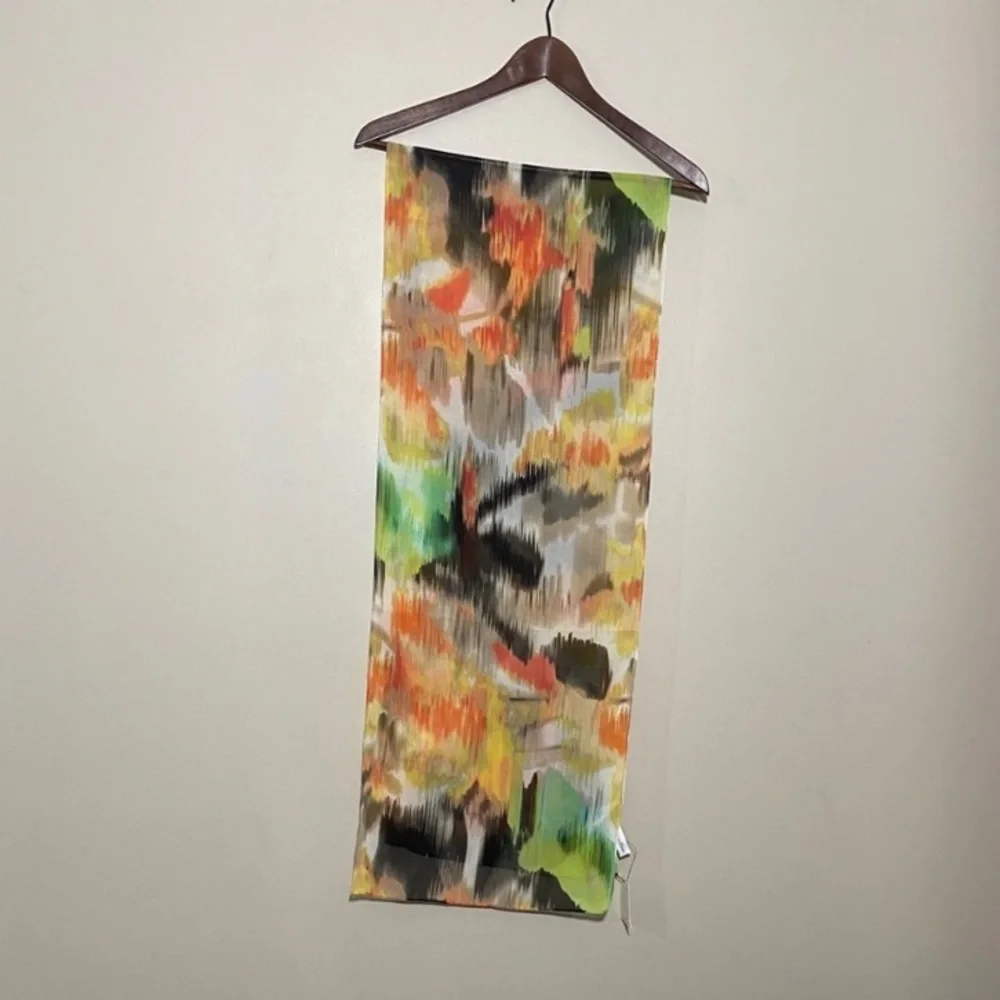 NWT Calvin Klein || woman’s multicolor scarf .L70”W14”